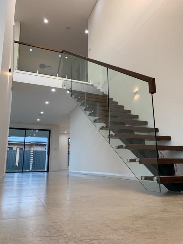 Mono Stringer Modern Staircase with glass railing in Sydney Australia_ Mono Stringer Modern Staircase with Glass Railing in Sydney Australia
